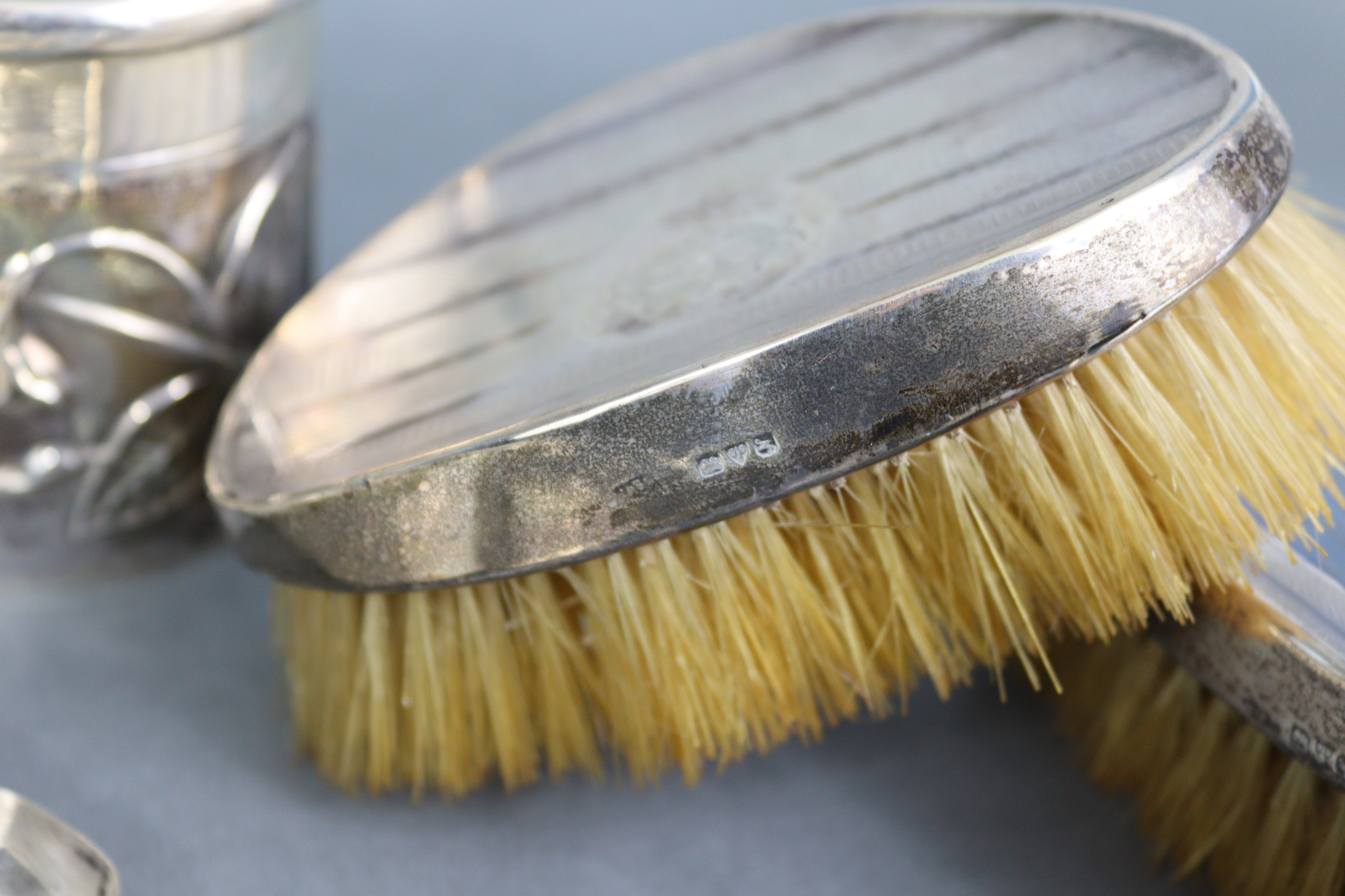 An Edwardian silver dressing table tray with raised crimped border, embossed decoration of - Image 9 of 9