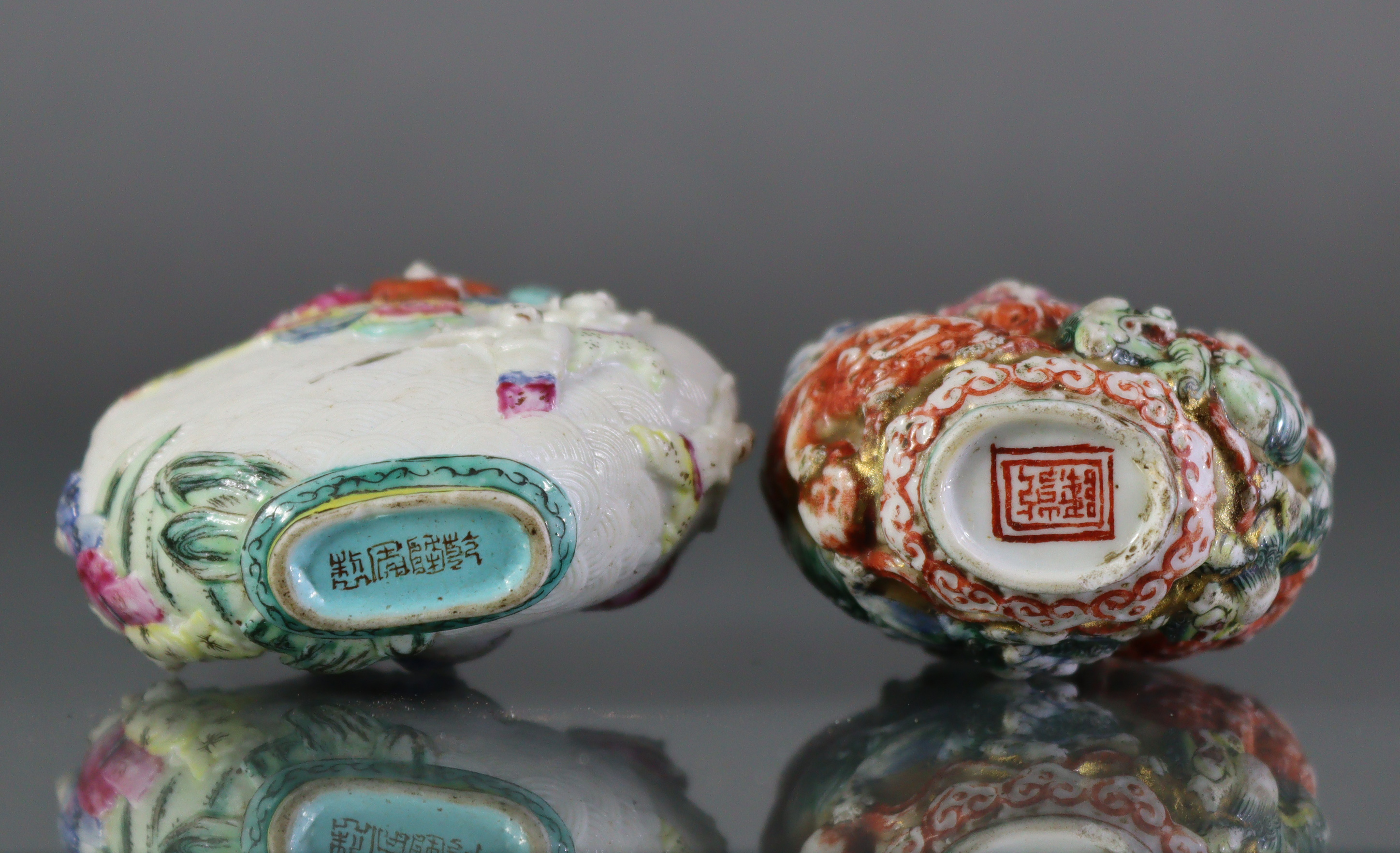 Three Chinese moulded porcelain snuff bottles, the largest decorated with a dragon & phoenix in - Image 5 of 5