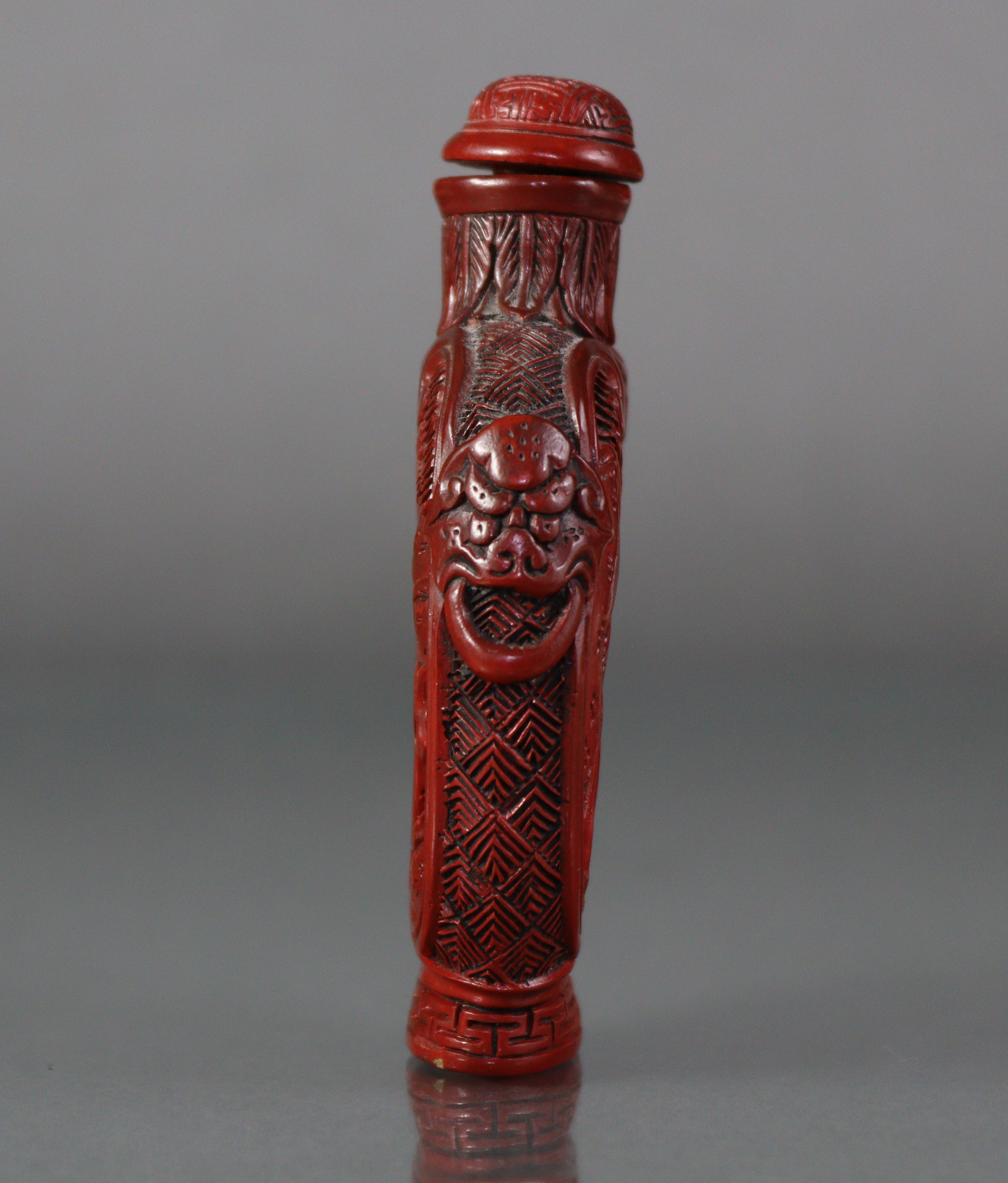A Chinese cinnabar lacquer large snuff bottle of ovoid form, with flat sides, each carved with a - Image 3 of 7