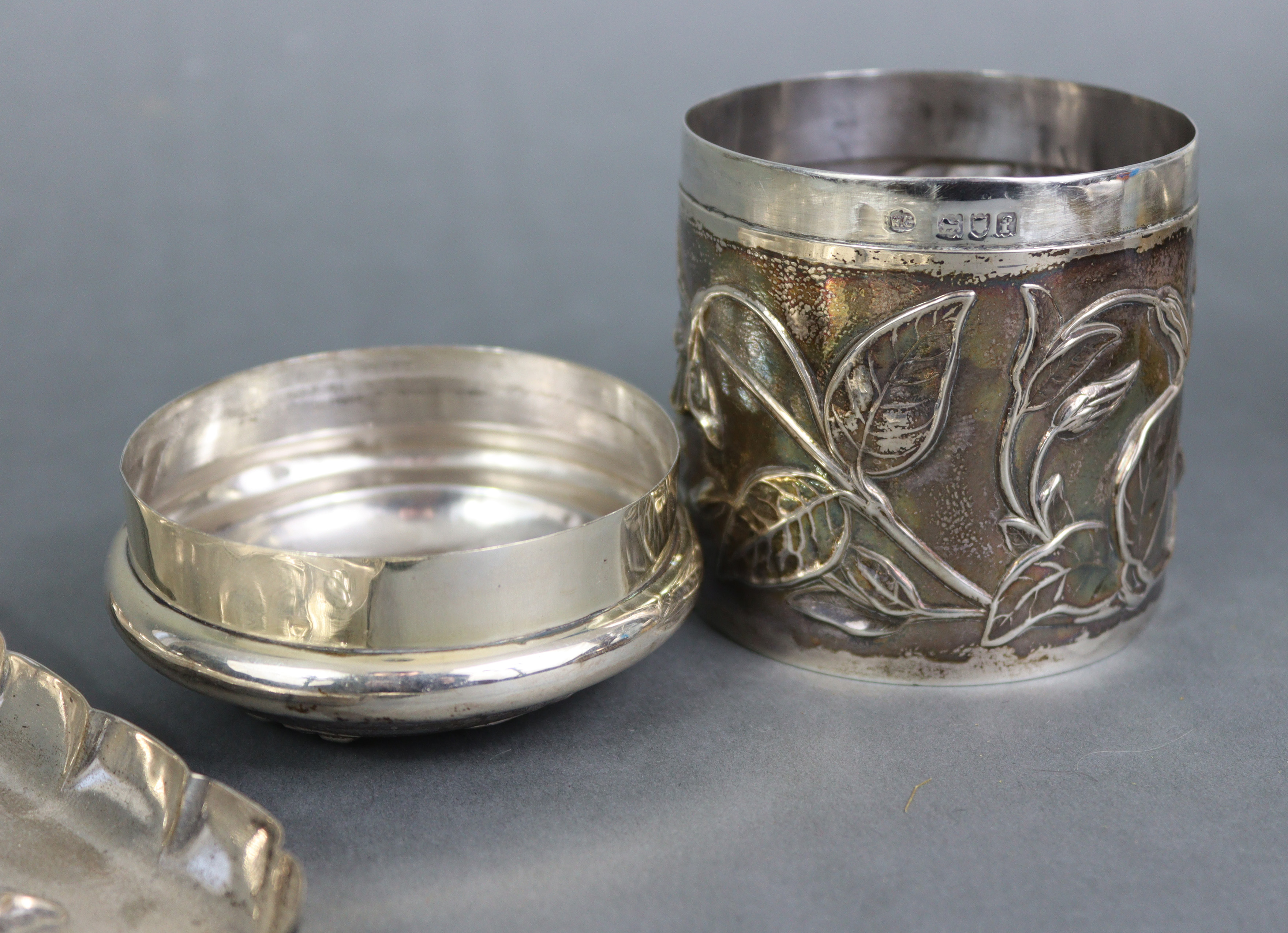 An Edwardian silver dressing table tray with raised crimped border, embossed decoration of - Image 7 of 9