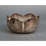 A plain deep silver bowl with petal-shaped rim, Dublin 1967 by Royal Irish Silver Ltd., 5” wide x