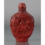 A Chinese cinnabar lacquer large snuff bottle of ovoid form, with flat sides, each carved with a