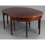 A Georgian mahogany D-end dining table with plain top & frieze, fitted single leaf, on square fluted