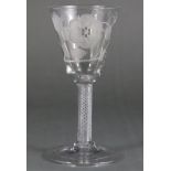 AN 18th century LARGE JACOBITE DRINKING GLASS, the pointed funnel bowl engraved with a six-petal