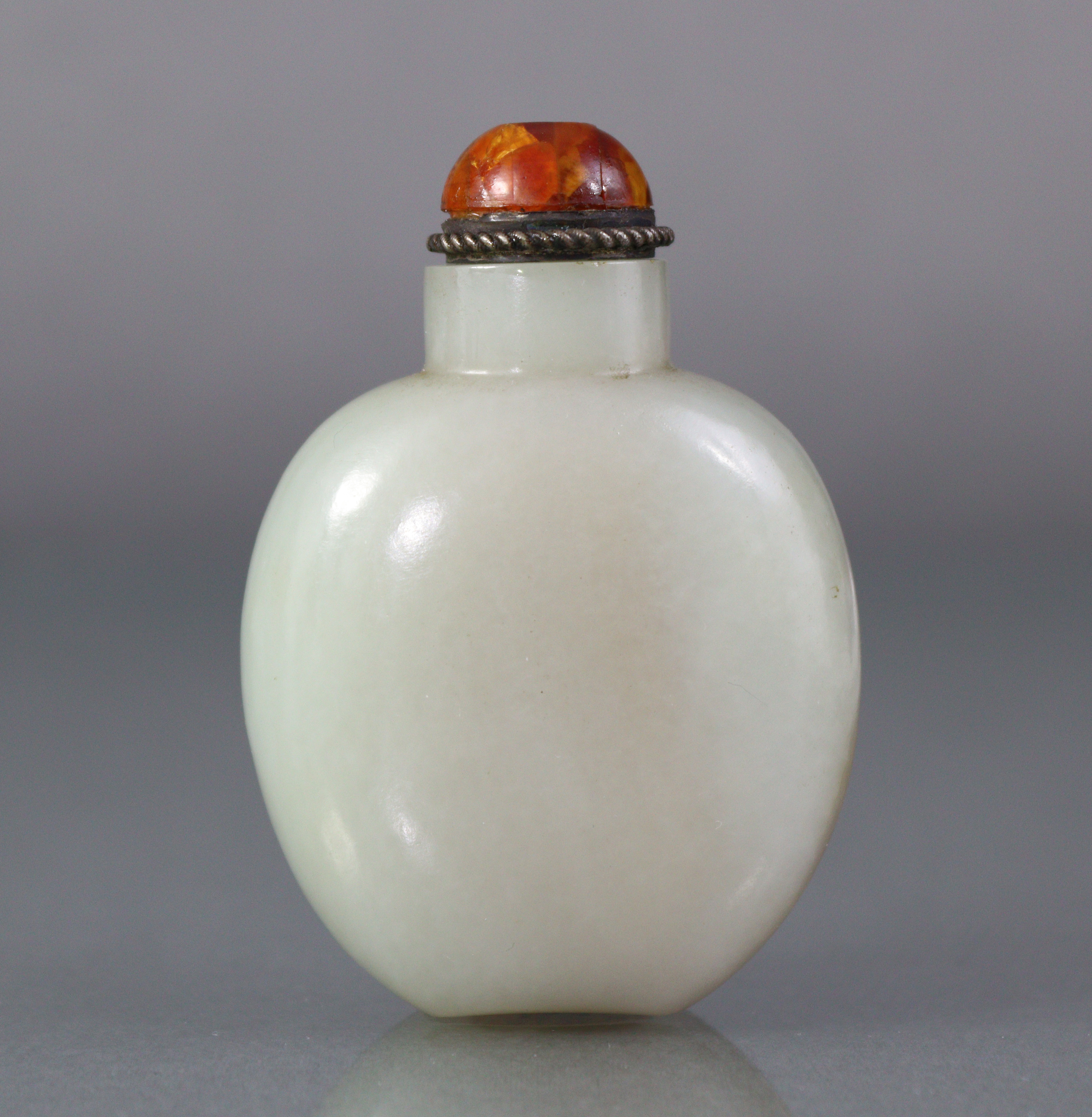 A Chinese pale celadon jade snuff bottle of rounded ovoid form, with russet coloured vein to one - Image 4 of 12