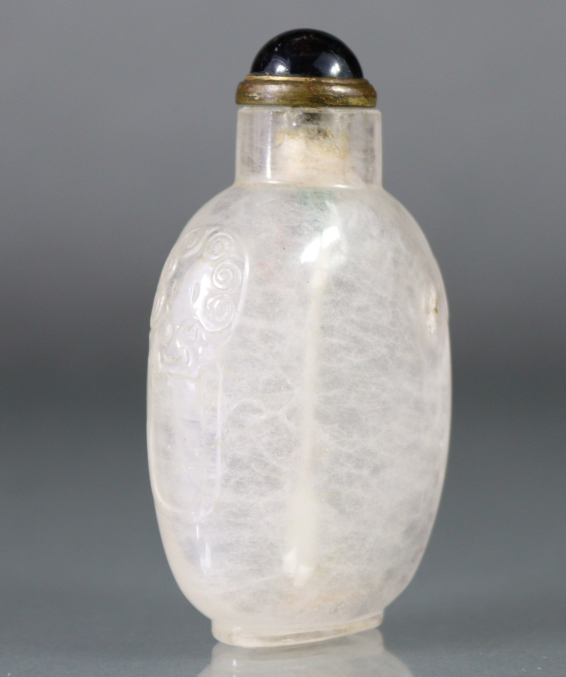 A Chinese carved crystal snuff bottle of rounded ovoid form, with mask-&-ring handles to each - Image 3 of 11