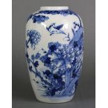 A 19th century Japanese blue & white porcelain ovoid vase decorated with birds amongst foliage,