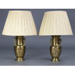 A pair of Japanese overlaid bronze vases forming table lamps, of baluster form & decorated with
