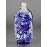 A Chinese blue overlay clear glass snuff bottle of flat-sided rectangular form, each side