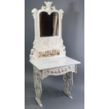 A Coalbrookdale-style white painted cast-iron dressing table, the tall mirror back