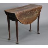 A mid-18th century mahogany drop-leaf table with circular top, on turned legs with pad feet, 36½”