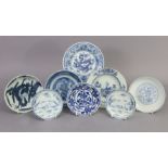 A group of eight Chinese blue & white dishes including a pair of 18th century 4½” saucers