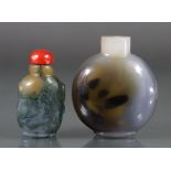 Two Chinese agate snuff bottles, the larger of rounded circular form, with lavender & green