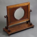 A William IV figured mahogany & rosewood combination shaving mirror/toilet glass, inset circular con