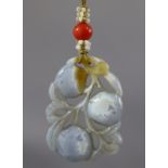An early 20th century Chinese lavender jade pendant, carved & pierced in the form of three fruit