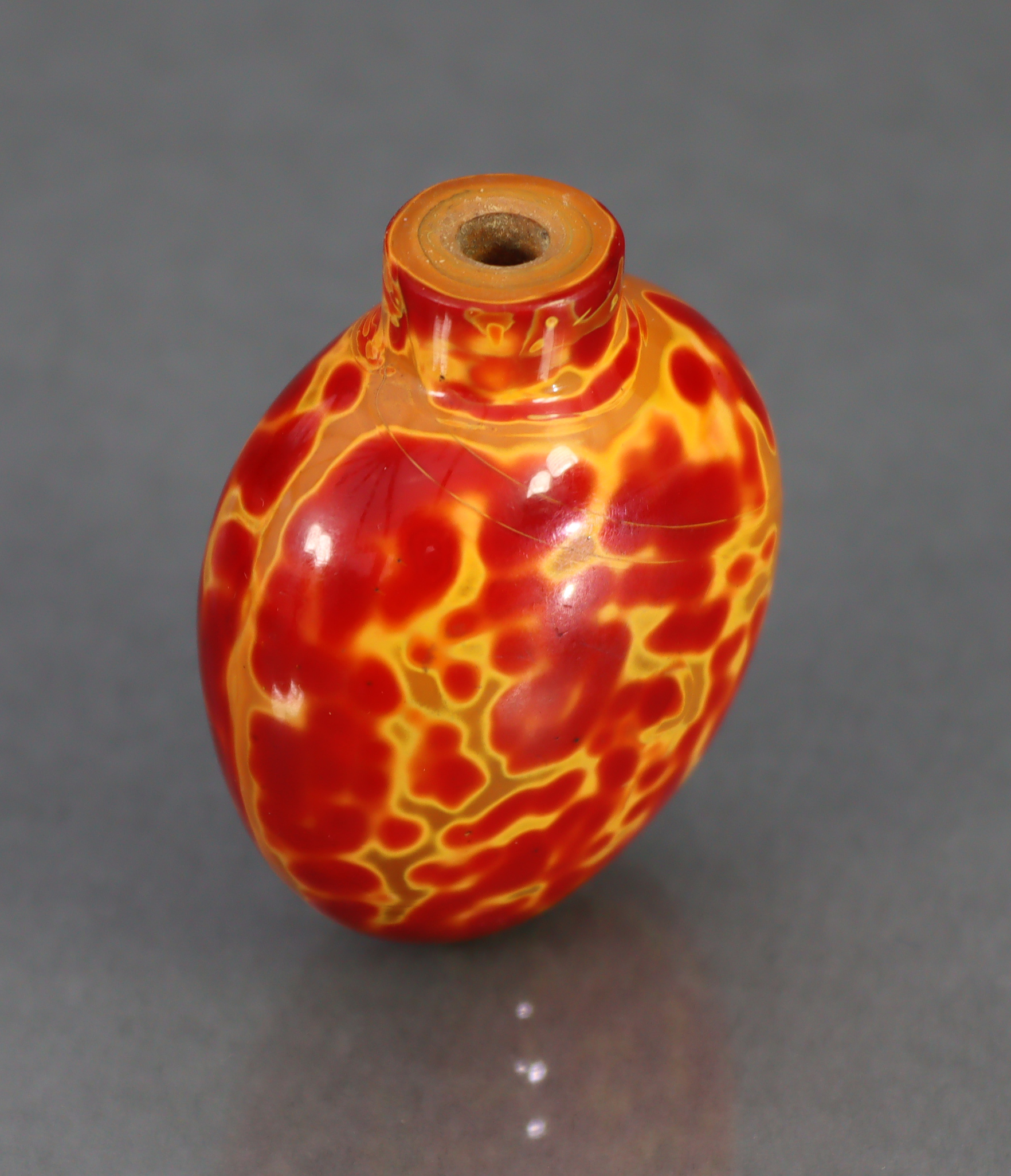 A CHINESE 'REALGAR' GLASS SNUFF BOTTLE, of rounded ovoid form & bright red & yellow colour, 2¼” high - Image 7 of 10