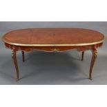 A LOUIS XV STYLE MAHOGANY DINING TABLE with rounded ends to the radially veneered & brass-edged