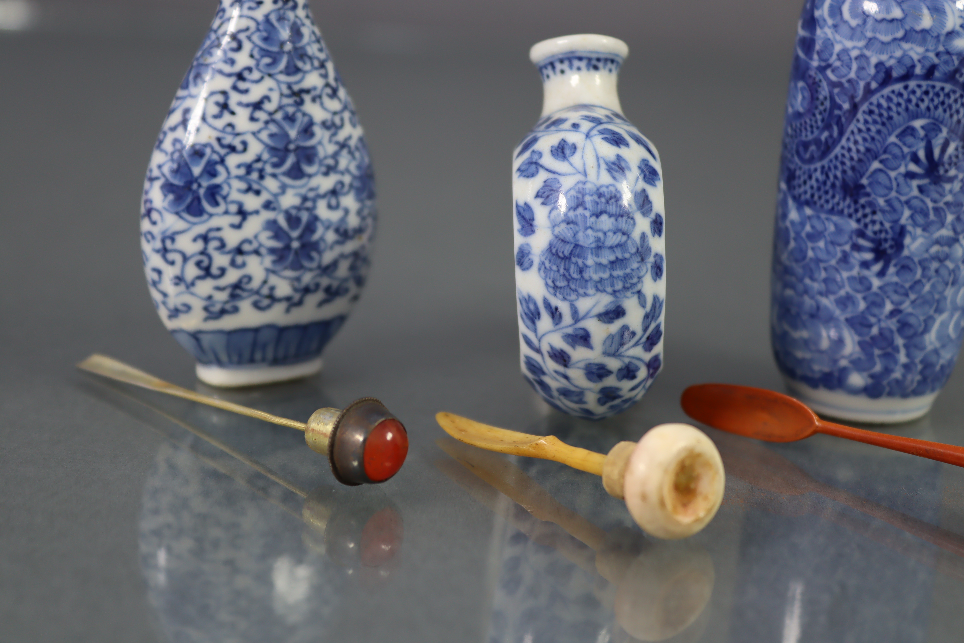 Three Chinese blue & white porcelain snuff bottles, comprising a peach form flat-sided bottle, - Image 7 of 8