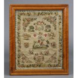 An early Victorian needlework sampler worked by Lucy Phillips, aged 11, dated May 4th, 1843, with