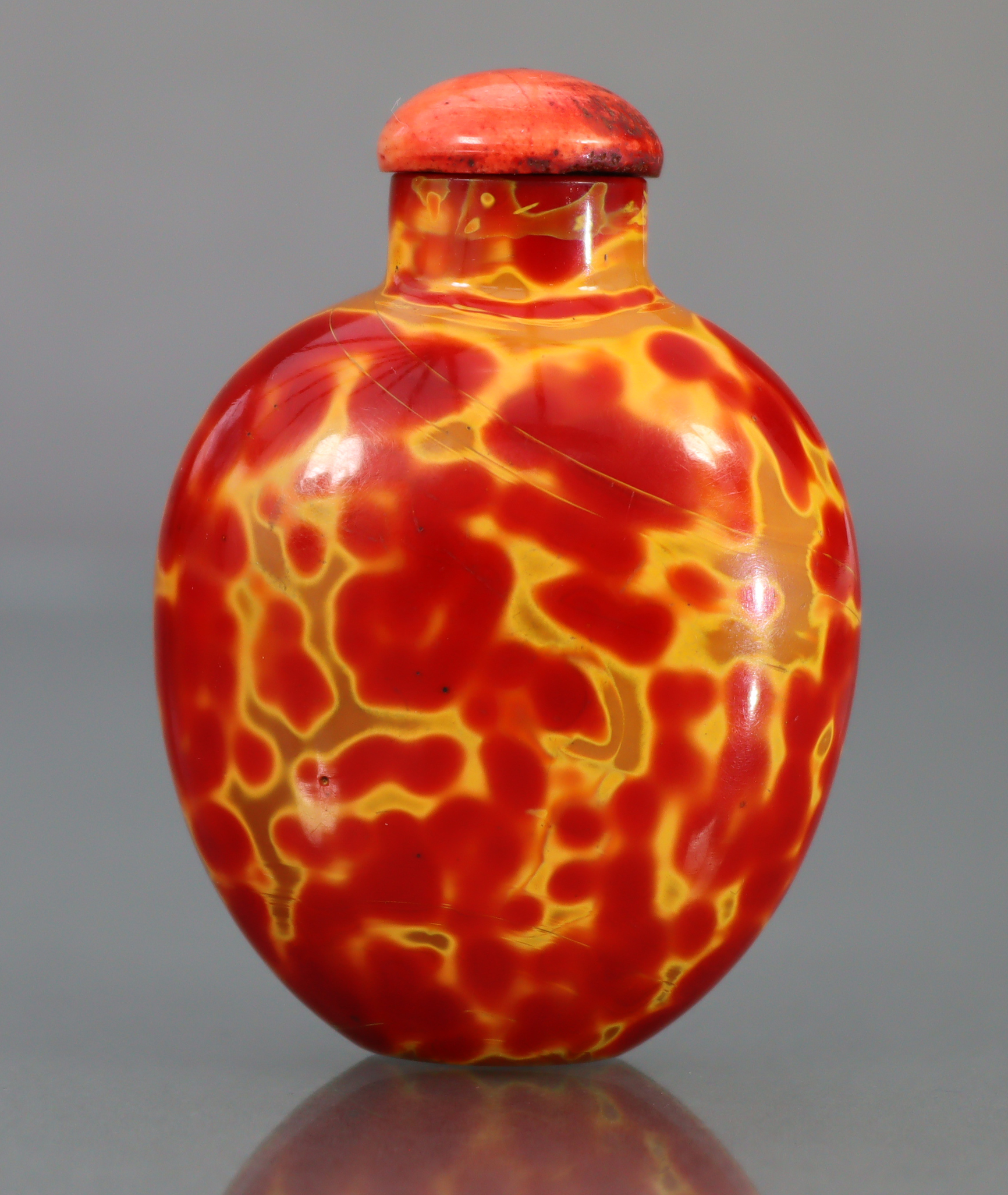 A CHINESE 'REALGAR' GLASS SNUFF BOTTLE, of rounded ovoid form & bright red & yellow colour, 2¼” high - Image 3 of 10