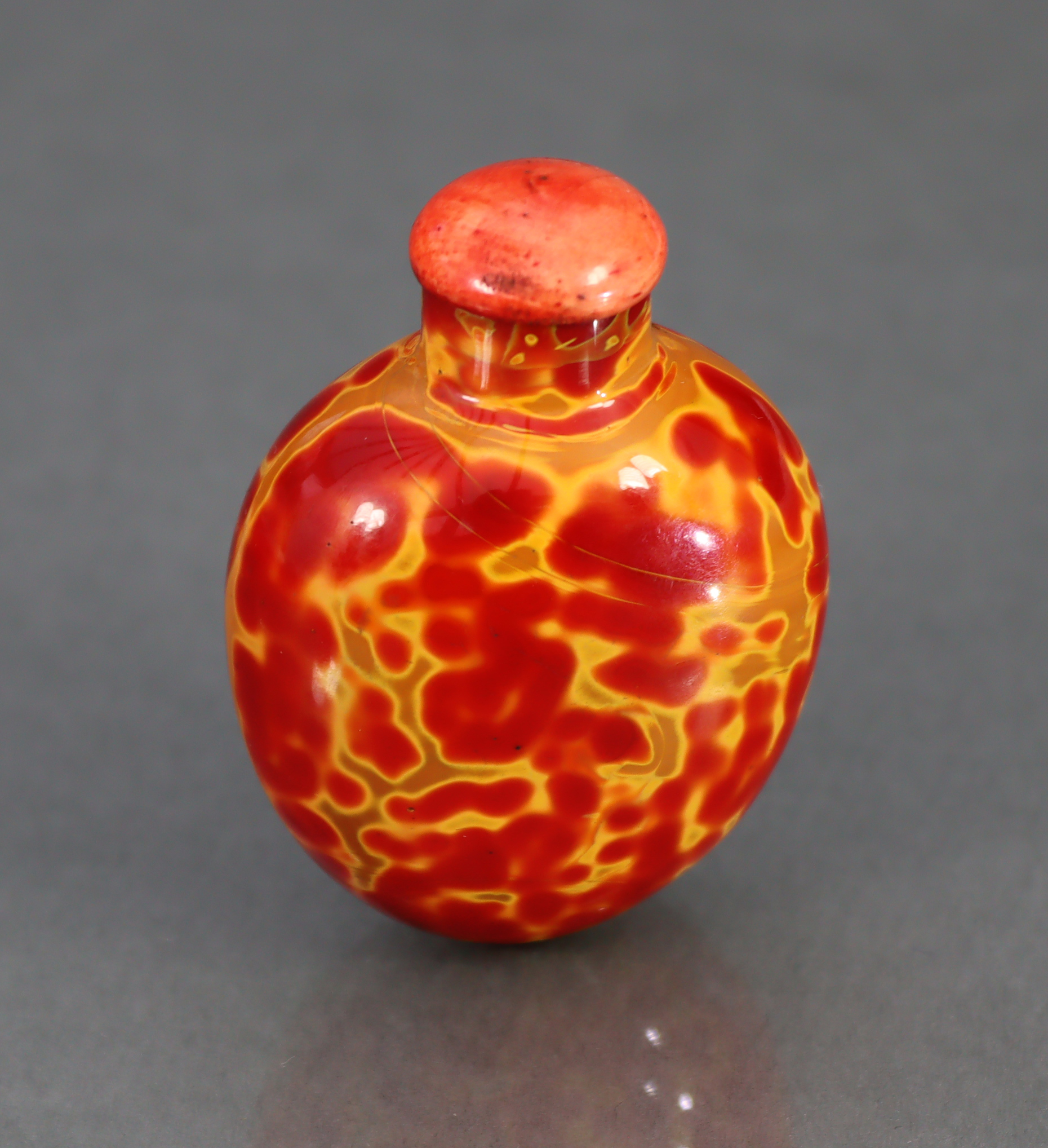 A CHINESE 'REALGAR' GLASS SNUFF BOTTLE, of rounded ovoid form & bright red & yellow colour, 2¼” high - Image 6 of 10