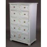 An early 20th century painted oak chest of five graduated drawers with brass knob handles, applied