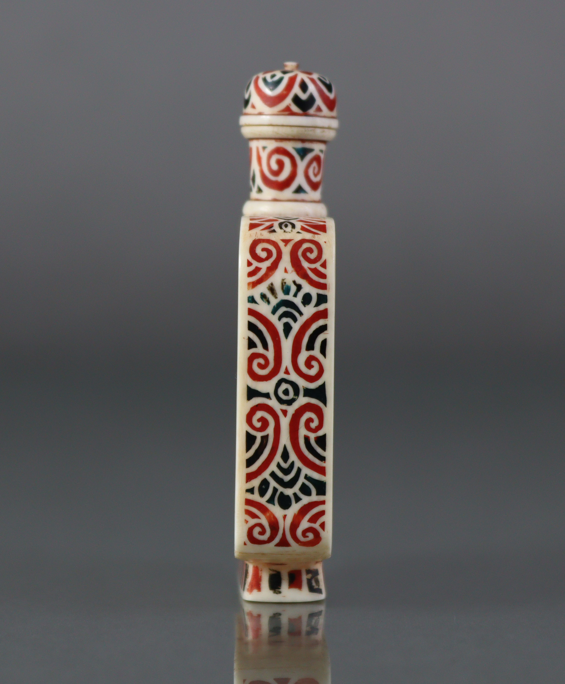 A Chinese stained ivory snuff bottle of flat-sided rectangular form, each side decorated with - Image 3 of 6