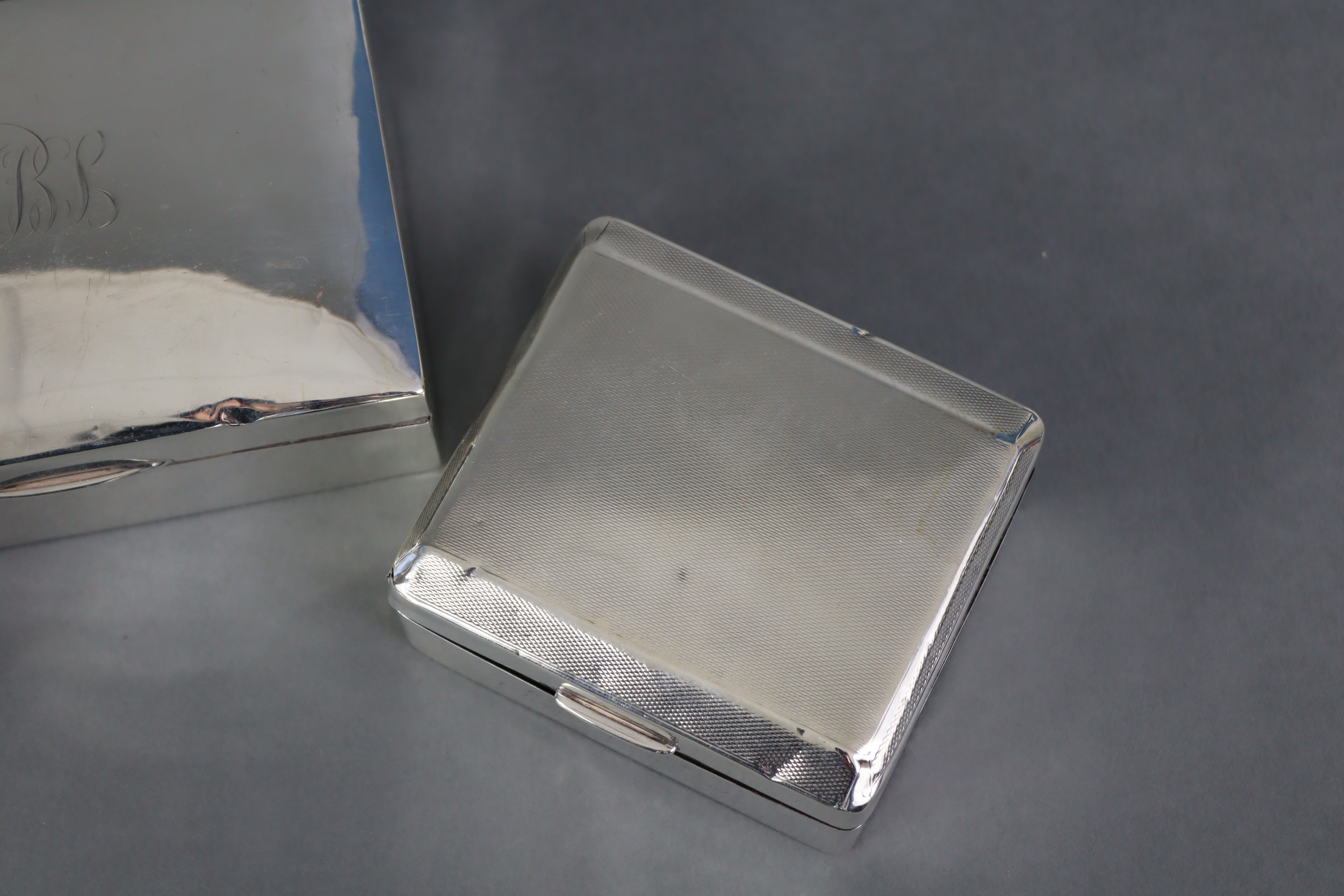 A silver rectangular cigarette box, with engraved initials to the hinged lift lid, Birmingham - Image 5 of 6