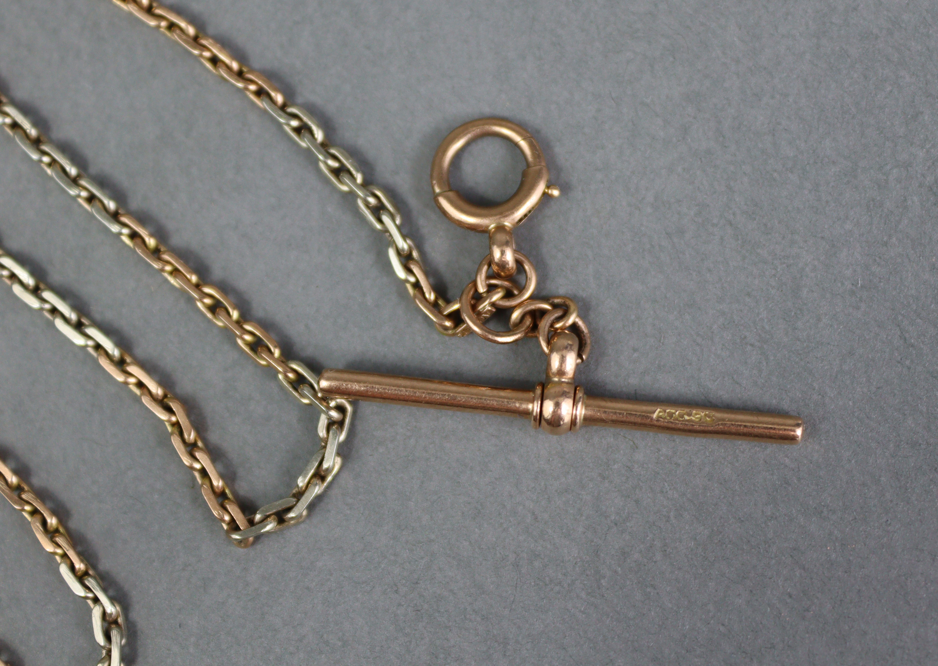 A 9ct. gold albert with alternating length of white & gold oblong links; 13¼” long. (9.4gm). - Image 2 of 2