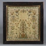 A William IV silk needlework sampler worked by Hannah Ellis, Aged 10, dated 1836, with Adam & Eve,