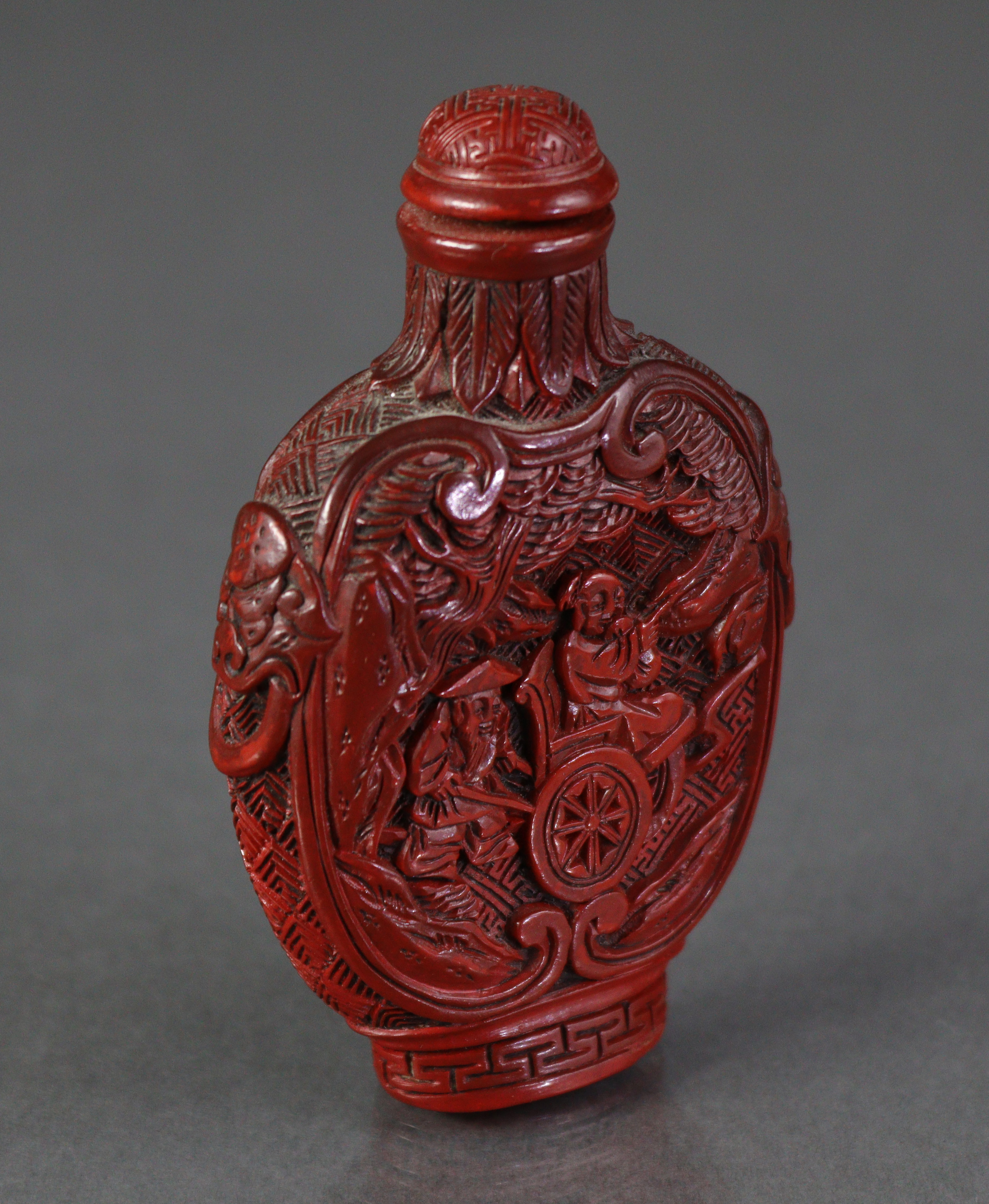 A Chinese cinnabar lacquer large snuff bottle of ovoid form, with flat sides, each carved with a - Image 4 of 7
