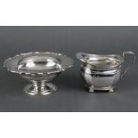 A silver circular sweetmeat dish, with shaped rim on a round pedestal foot, Birmingham 1932 by