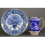 A mid-18th century Dutch Delft blue & white large dish, decorated with the “Peacock” pattern, with
