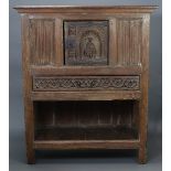 AN ANTIQUE OAK LIVERY CUPBOARD, incorporating early elements, with panelled top & sides, the arcaded