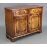 An 18th century-style mahogany rectangular side cabinet with crossbanded top, fitted two frieze