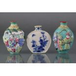 Two Chinese famille rose porcelain snuff bottles of ovoid form, each with figure scene decoration,