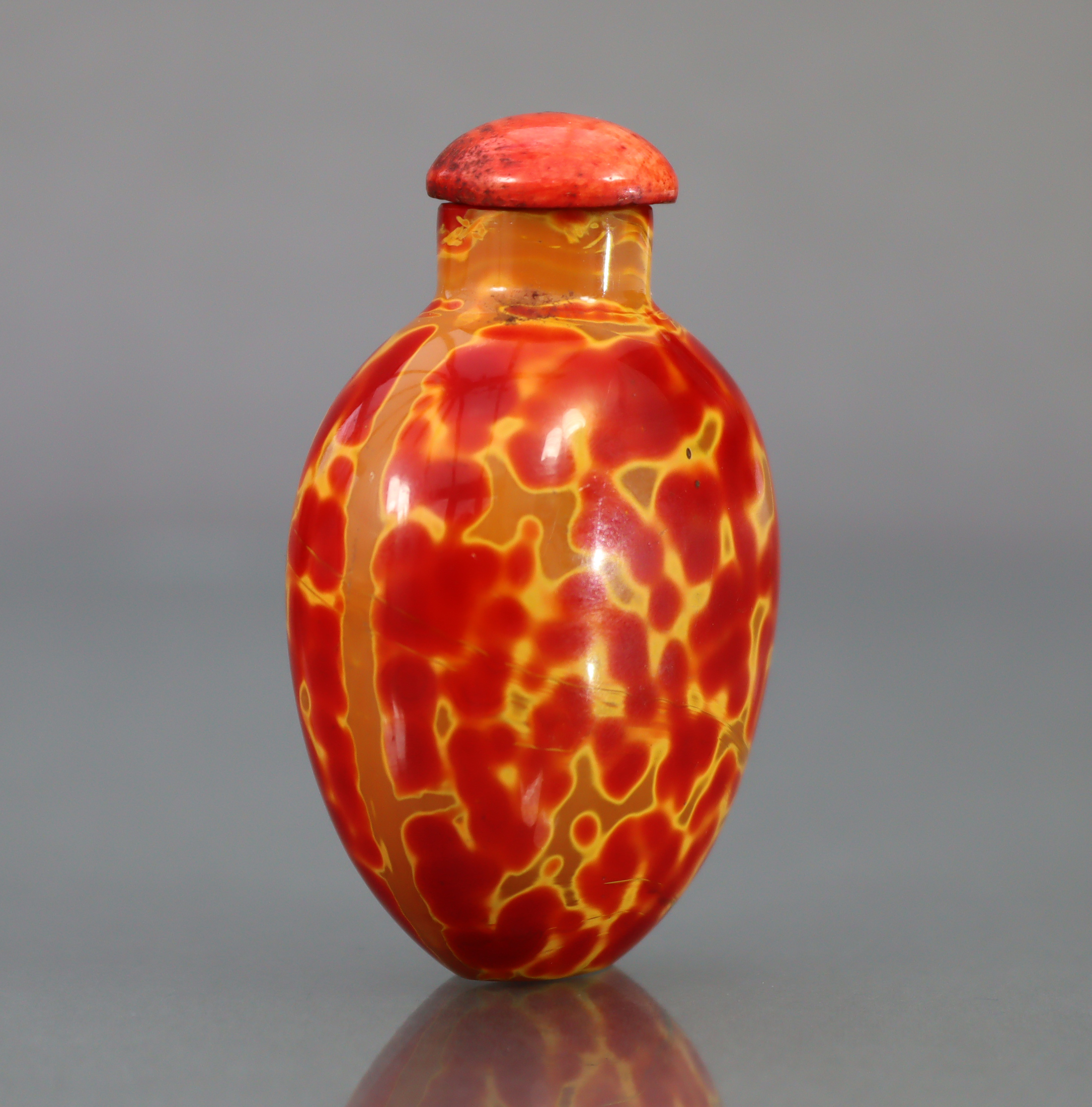 A CHINESE 'REALGAR' GLASS SNUFF BOTTLE, of rounded ovoid form & bright red & yellow colour, 2¼” high - Image 2 of 10