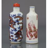 A Chinese underglaze blue & copper-red porcelain cylindrical snuff bottle, decorated with a figure