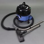 A Numatic “Henry” cylinder vacuum cleaner, w.o.