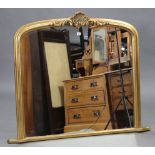 A 19th century-style -gilt frame overmantel mirror, with moulded frieze & rounded top, 50” wide x