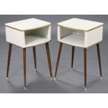 A pair of Kraft mid-20th century white & gold vinyl bow-front bedside tables, each with open recess,