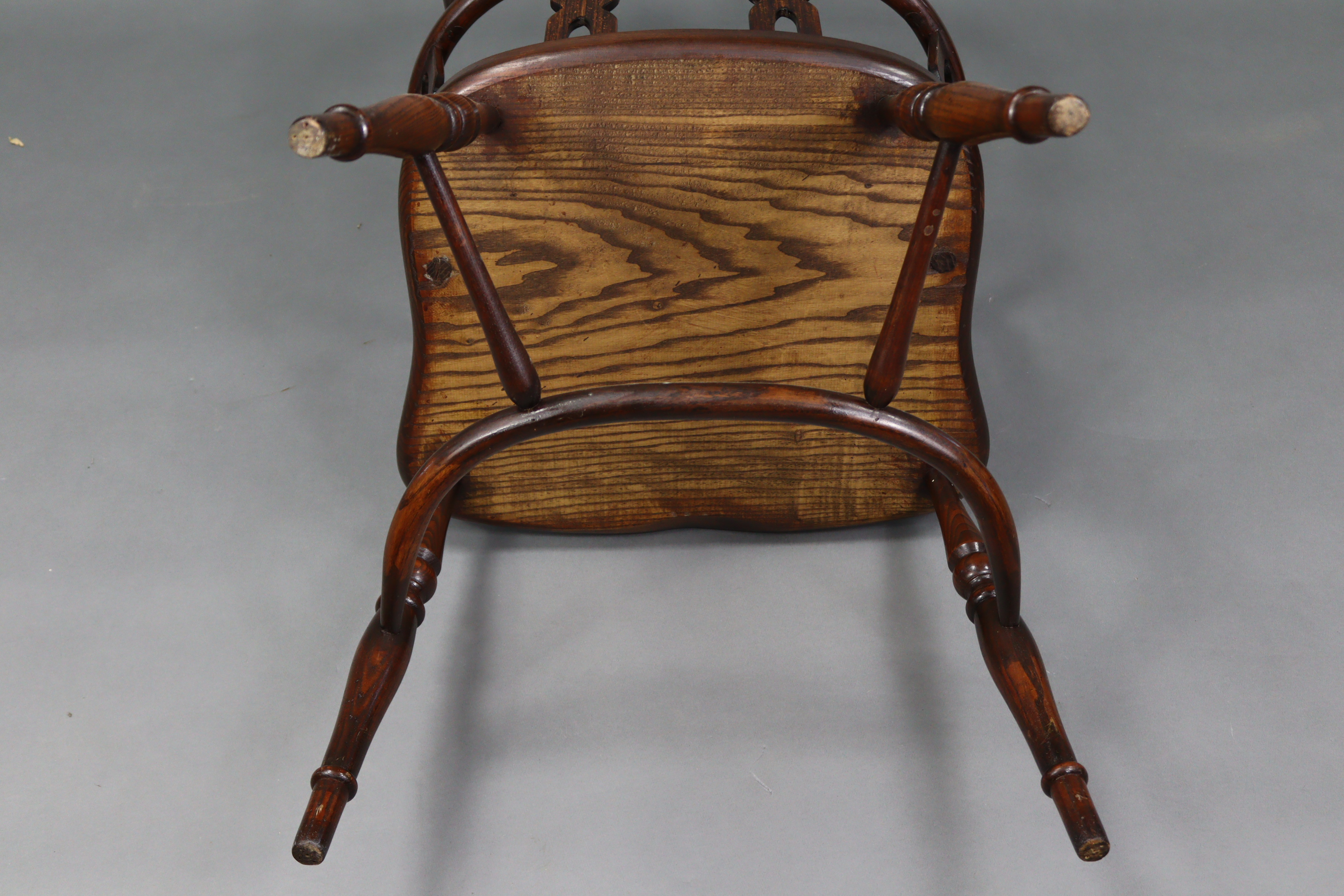 A Windsor-style ash & elm carver chair with pierced & shaped splats to the open back, with hard - Image 5 of 5