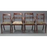A set of four regency-style mahogany bow-back dining chairs (including a pair of carvers) with