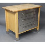 A maple-finish kitchen side unit, fitted three long graduated drawers with stainless steel fronts, &