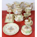 A Fielding’s Crown Devon “May” pattern oval teapot & stand; a ditto set of three graduated water