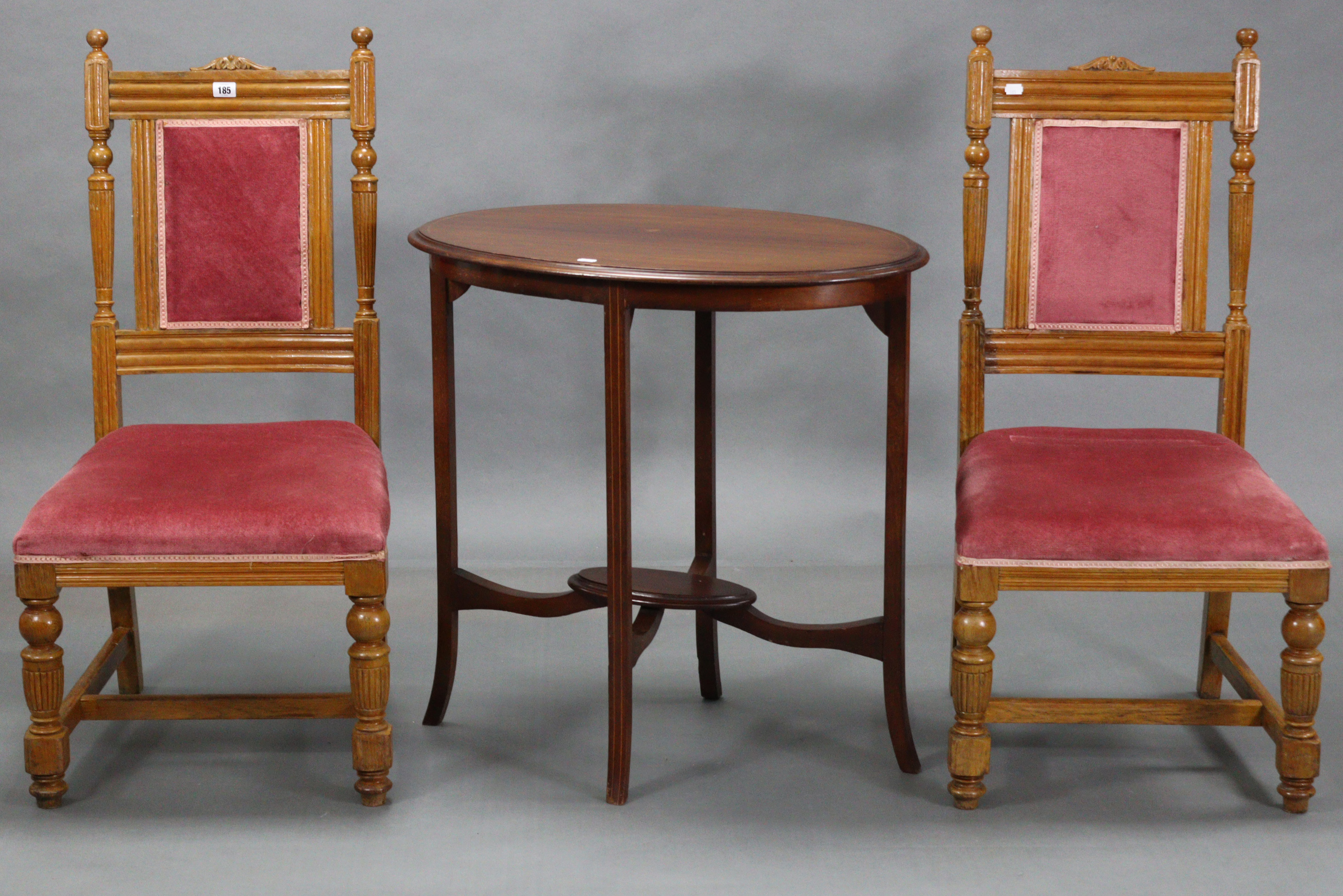 A pair of late Victorian bedroom chairs with padded backs & sprung seats upholstered pink