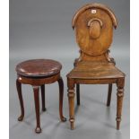 A Victorian oak hall chair with oval back, hard seat, & on turned tapered legs; together with a