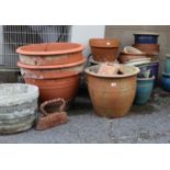 Twenty-two various garden flower pots.