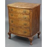 A reproduction birds-eye-maple small bow-front chest fitted four long graduated drawers with