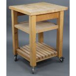 A beech butcher’s block/kitchen island of three rectangular tiers, & on square supports with